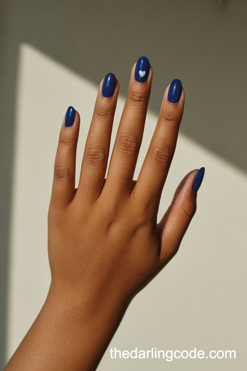 Sapphire Blue Ovals With Tiny White Heart Accent