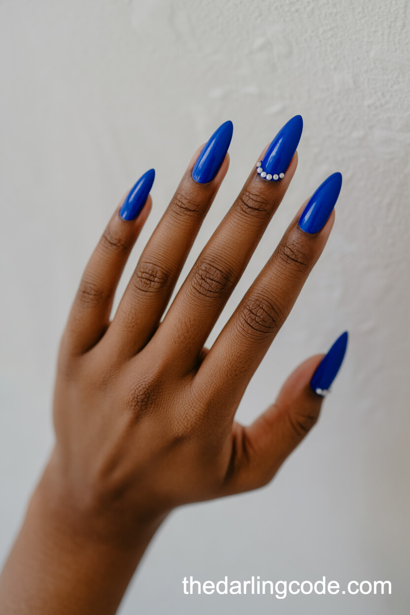 Glossy Cobalt Blue Stilettos With Pearl Cuticle Accents