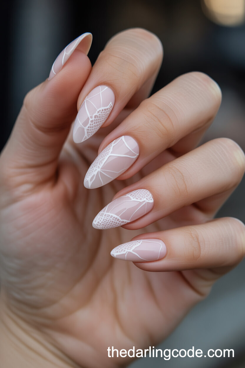 Blush Stiletto Nails With Lace Patterns