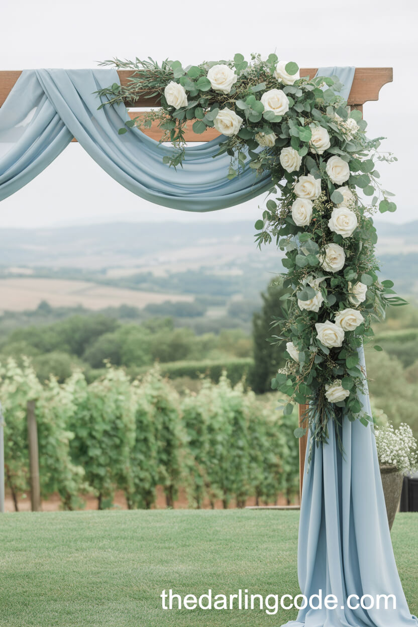 Ceremony Arch Draped In French Blue Fabric