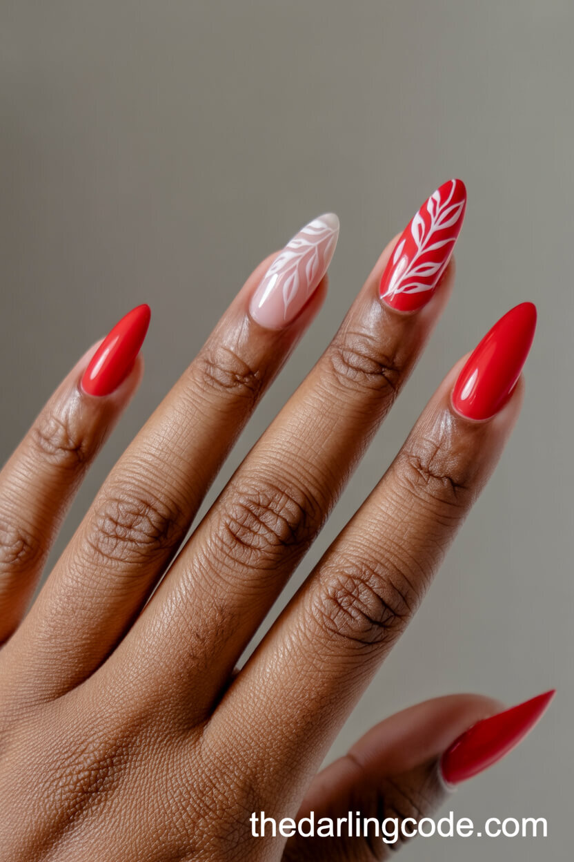 Red Almond Nails With White Leaf Designs