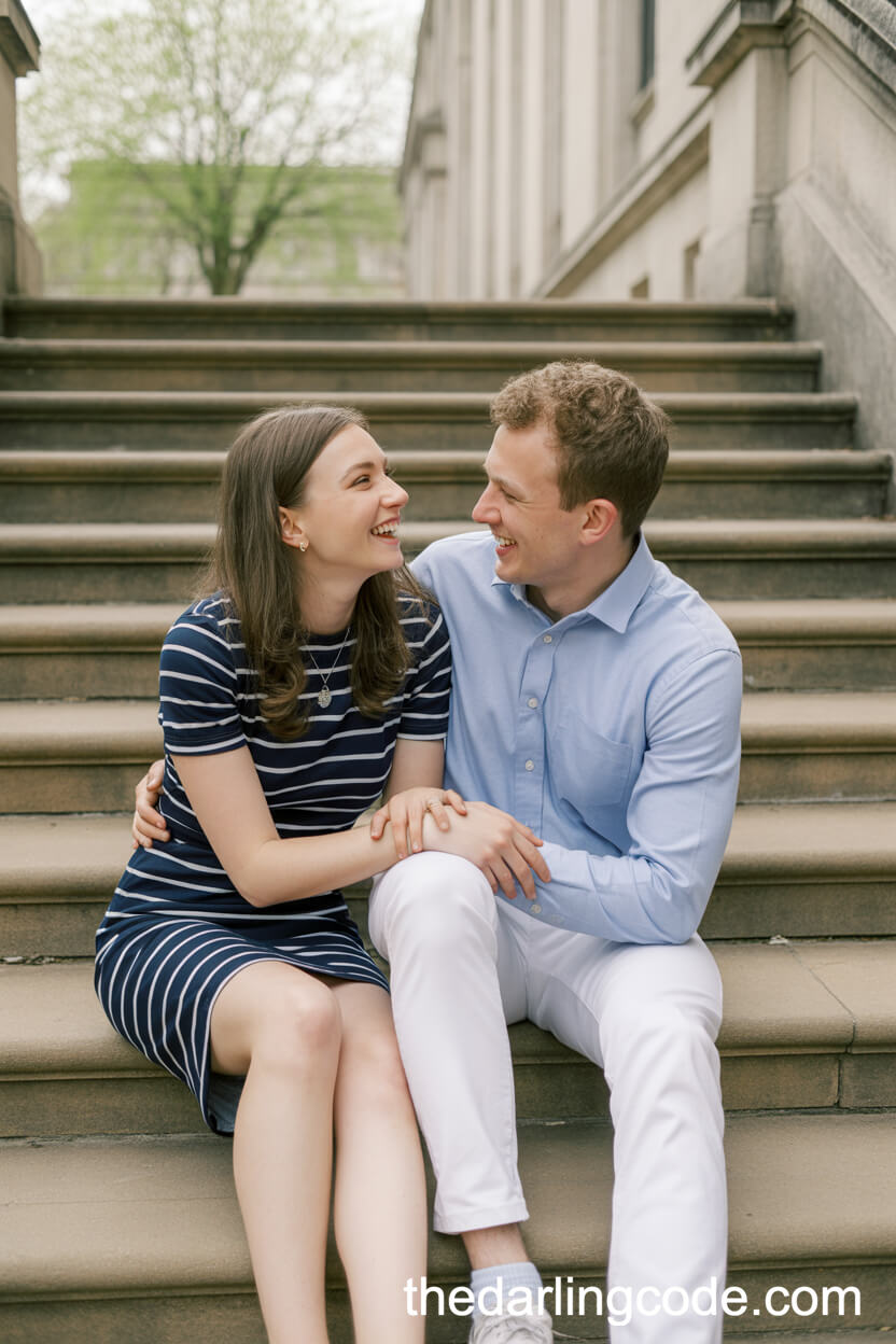 Navy And White Striped Dress With Light Blue Accents On Stone Library Steps