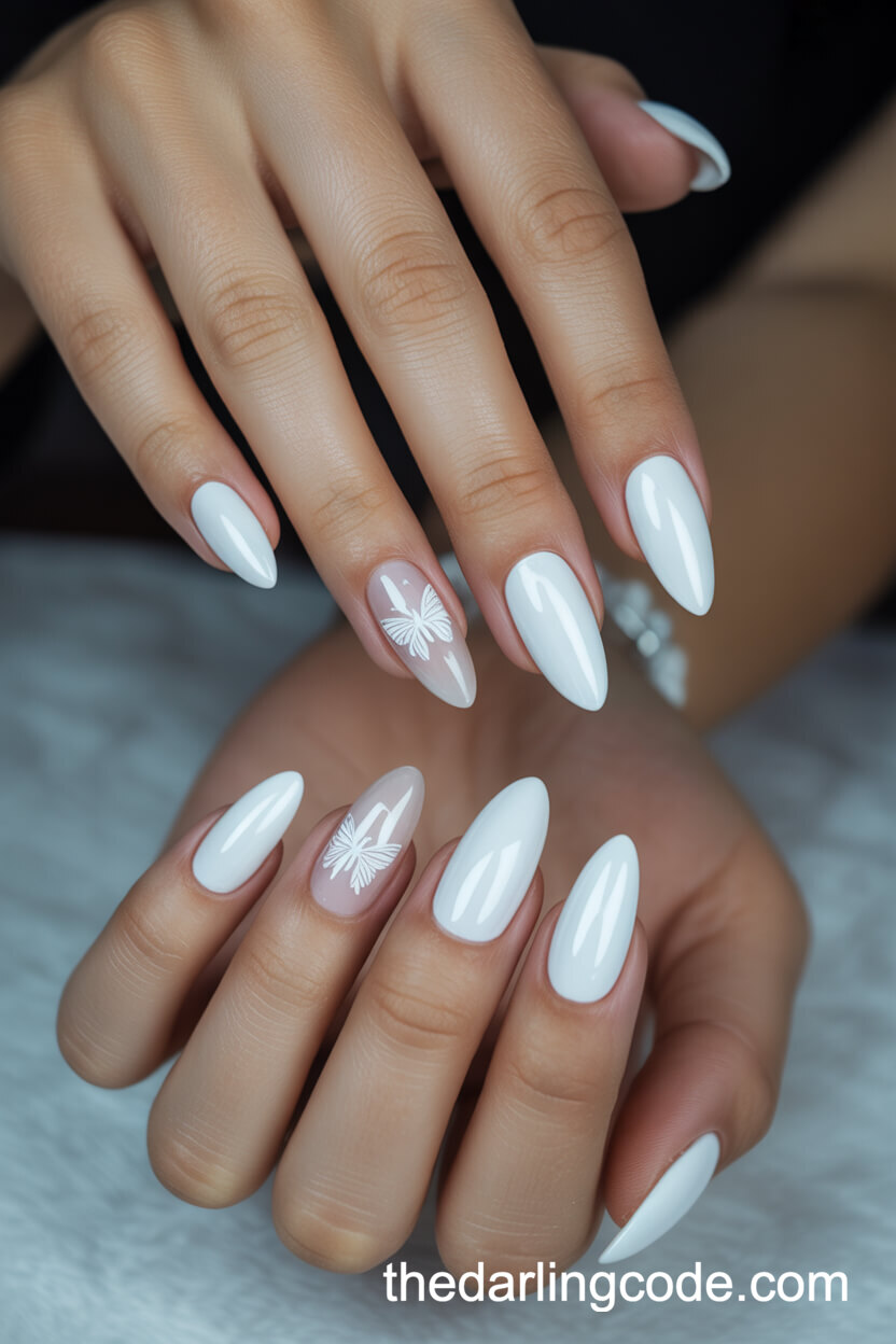 White Almond Nails With Delicate Butterfly Accents